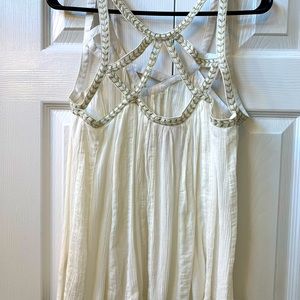 Large flowing, gold detailed tank top.